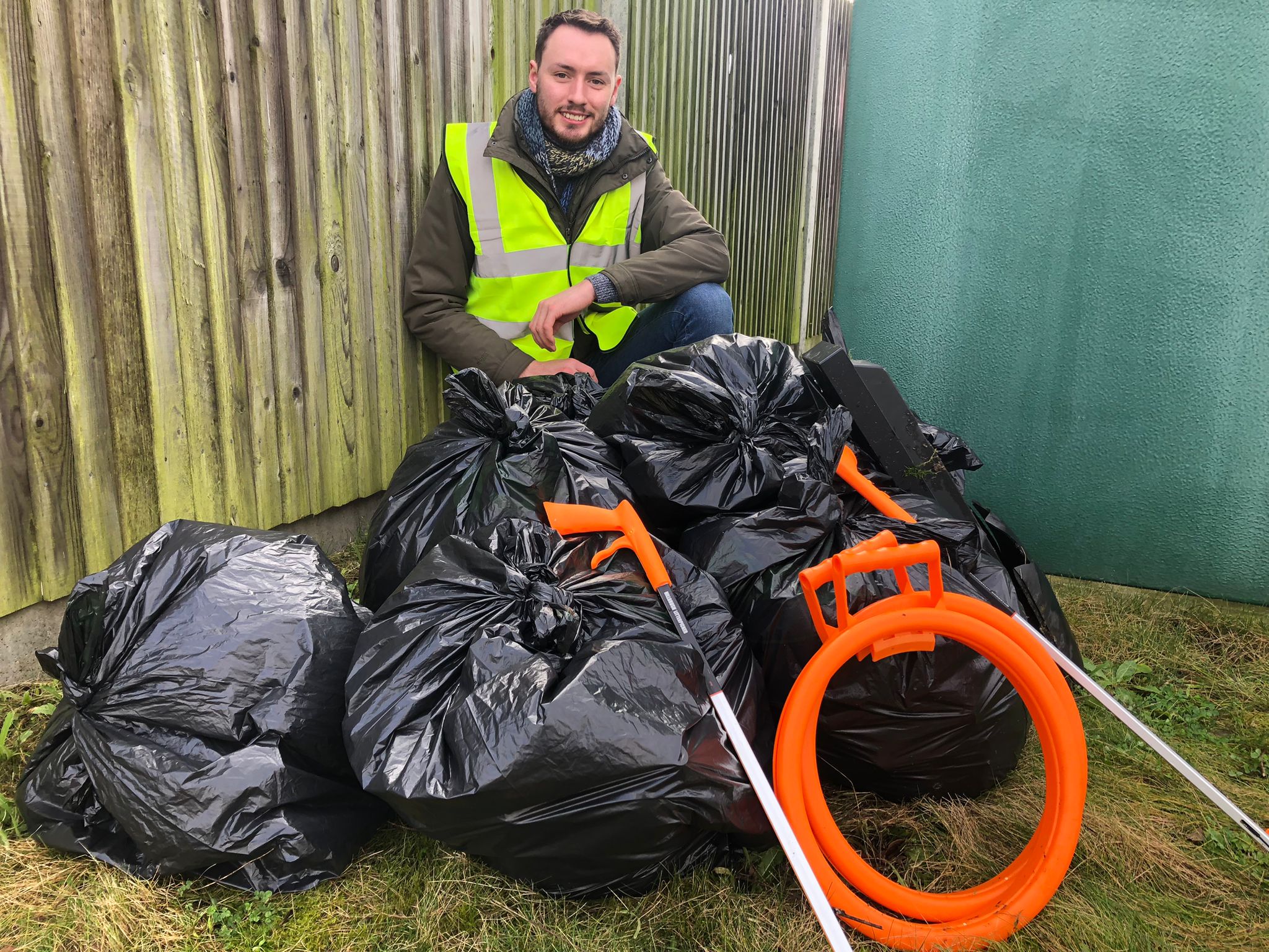 Parish councillor Matt Nightingale picks litter